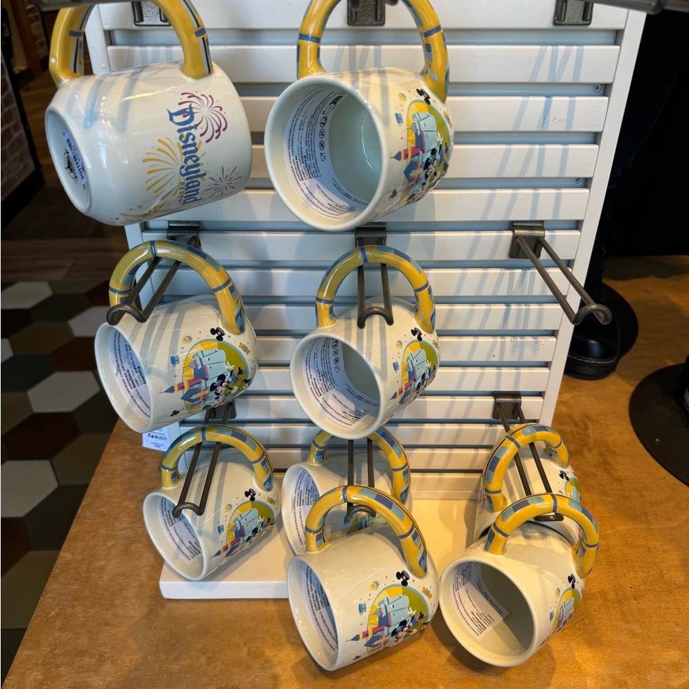 Disney Disneyland White Ceramic Mug with Yellow Handle and Park Illustration